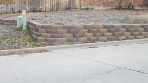 Image of small; stone block wall