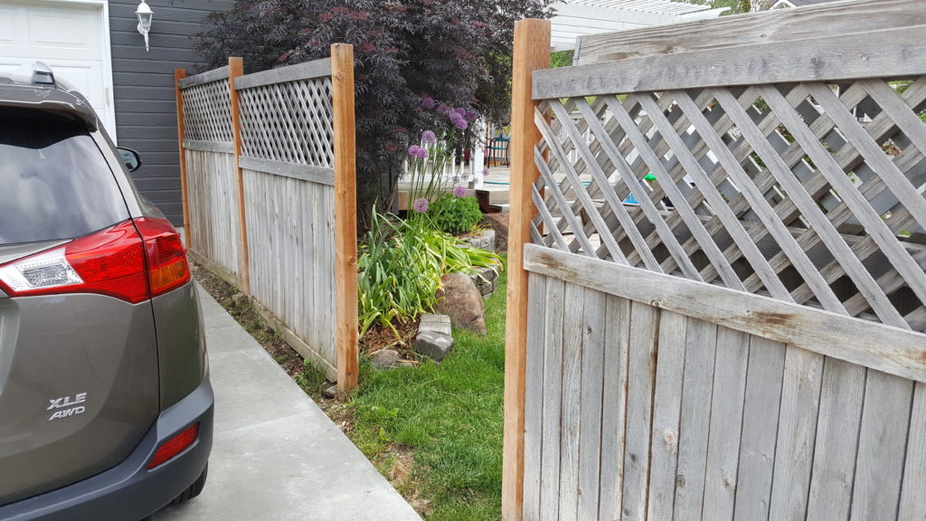 Image of a fence with section missing