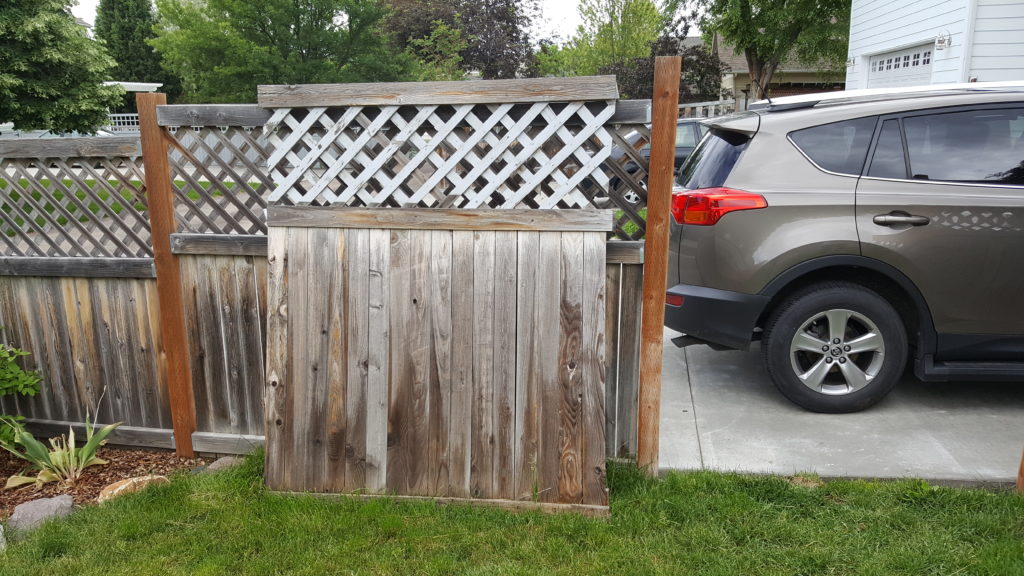 Image of a fence with section missing