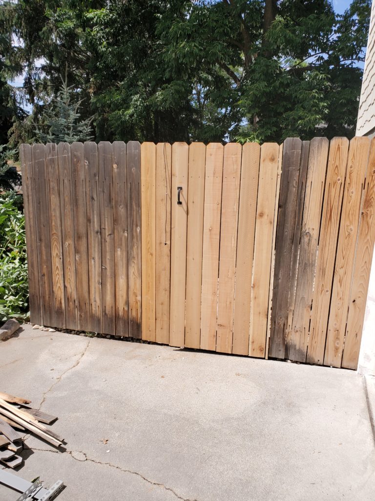 Image of a gate pickets replaced with new cedar pickets